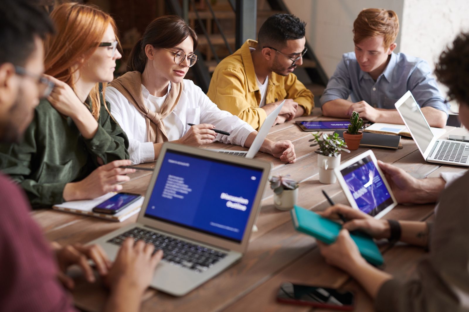 Team in a meeting at a work table